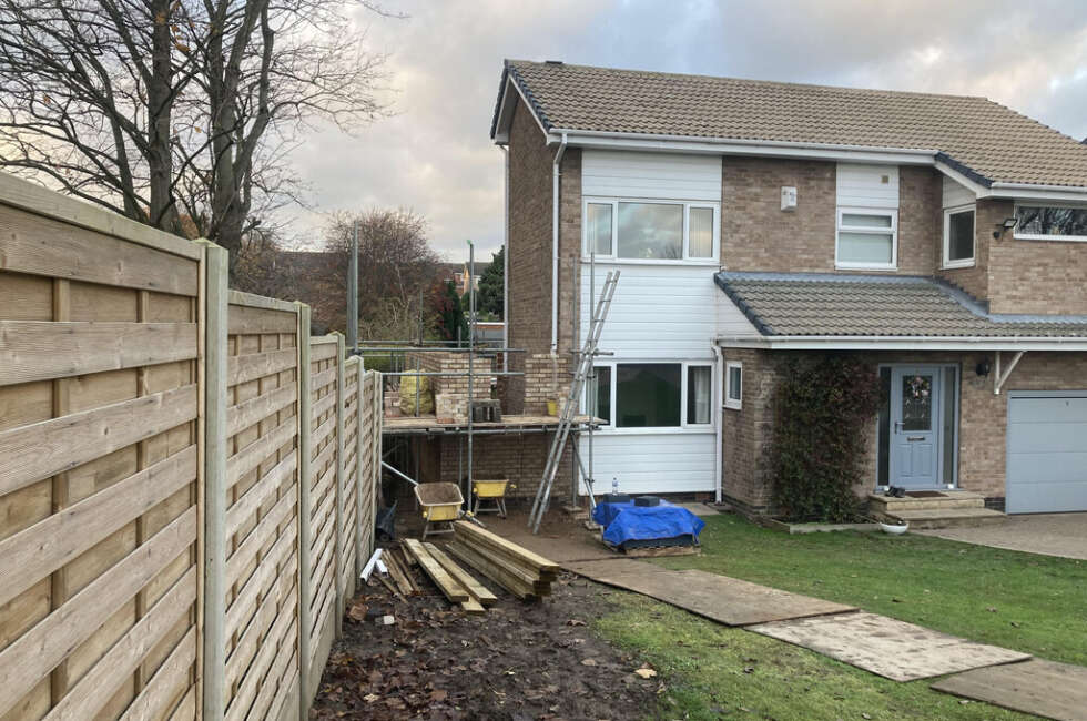 exterior of house showing an extension been built