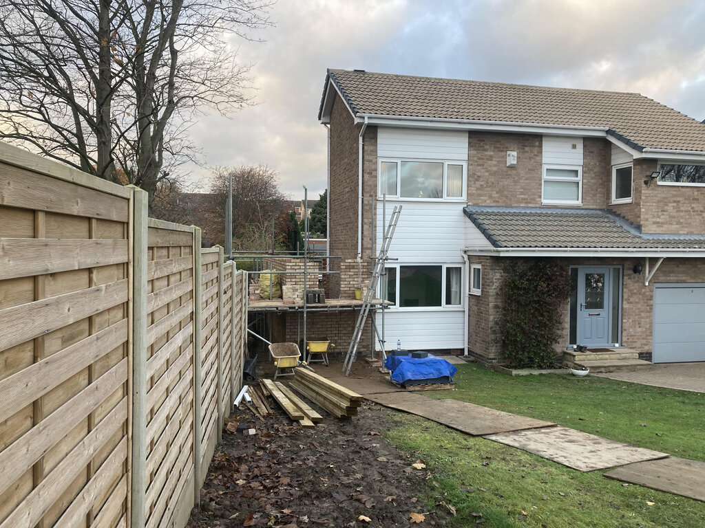 exterior of house showing an extension been built